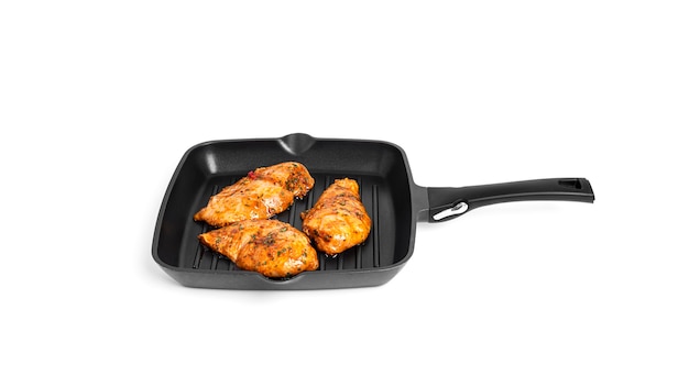 Chicken fillet on grill pan isolated