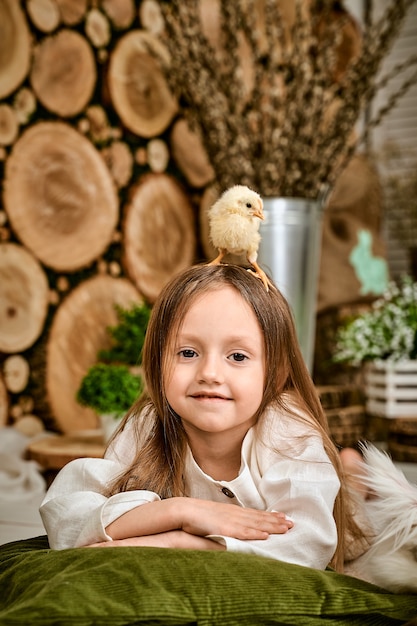 A chicken on the girl's head