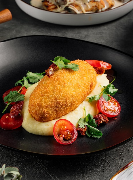 Chicken kiev cutlet with mashed potato