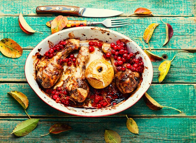 Chicken legs baked with viburnum