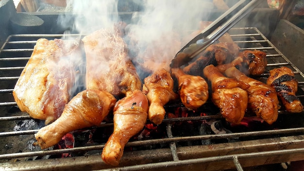 Photo chicken legs and pork smoke