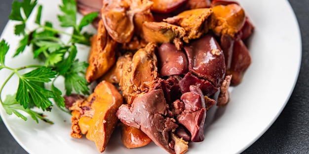 Foto fegato di pollo cucina frattaglie di pollo carne pasto cibo spuntino sul tavolo copia spazio sfondo alimentare