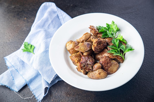 Chicken liver food fried or stewed offal meal snack on the table copy space