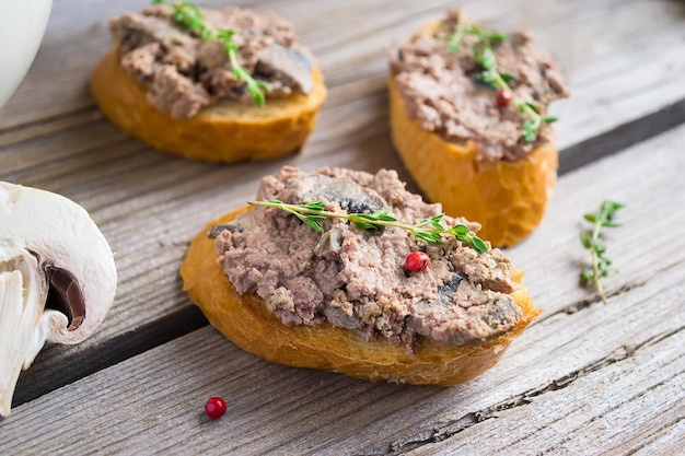 Chicken liver pate on toast, selective focus.