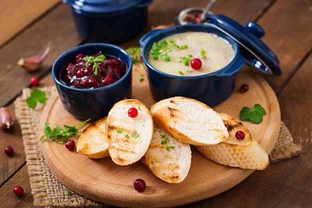 Chicken liver pate with cranberry sauce, served with croutons