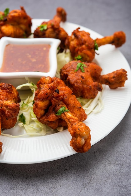 Chicken lollipop is Indian Chinese appetizer which is a frenched chicken winglet