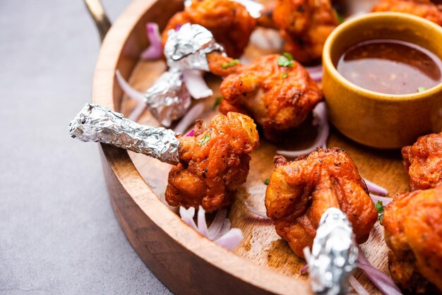 Chicken lollipop is Indian Chinese appetizer which is a frenched chicken winglet