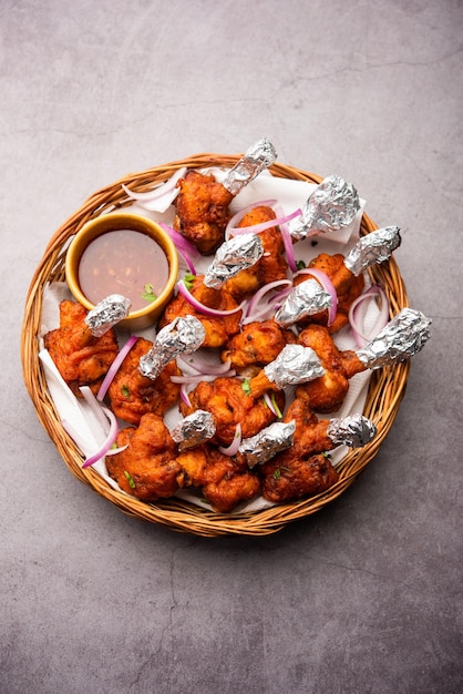 Chicken lollipop is Indian Chinese appetizer which is a frenched chicken winglet