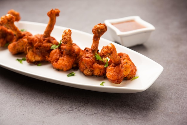 Chicken lollipop is Indian Chinese appetizer which is a frenched chicken winglet
