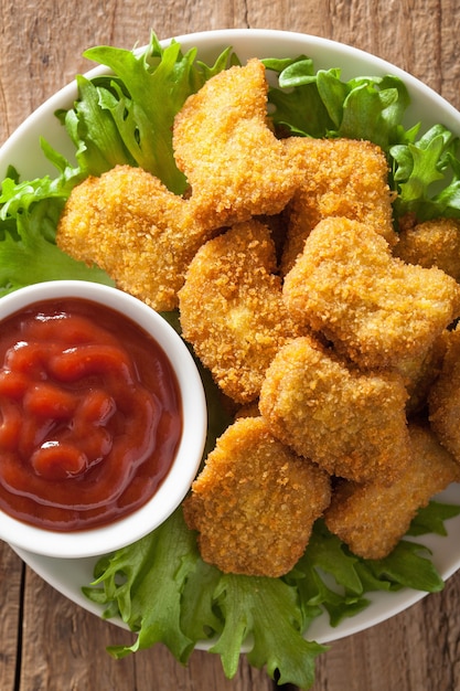 Chicken nuggets with ketchup