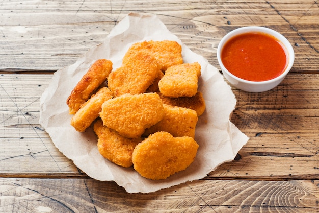 Chicken nuggets with tomato sauce 