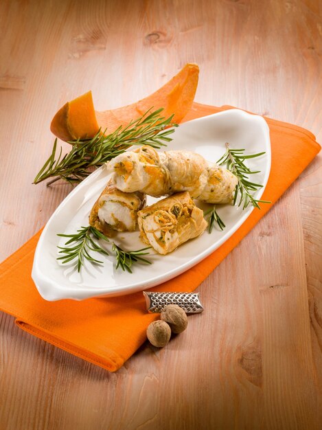 Chicken rolled up with pumpkin and rosemary