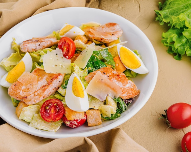 Chicken and shrimp caesar salad top view