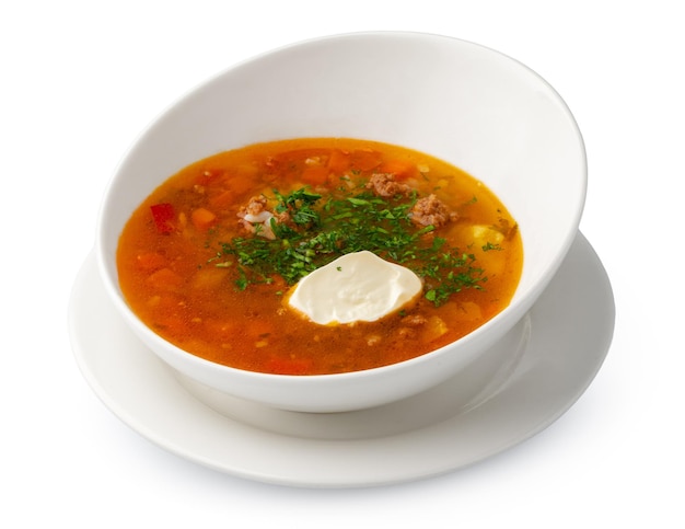 Photo chicken soup in bowl on white background