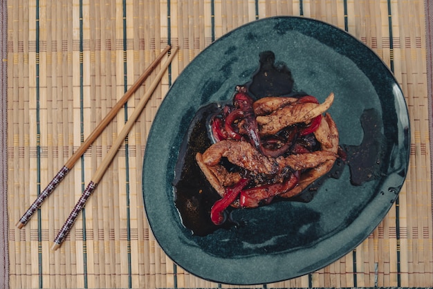 Chicken in soy sauce with red peppers with pomegranate desserts