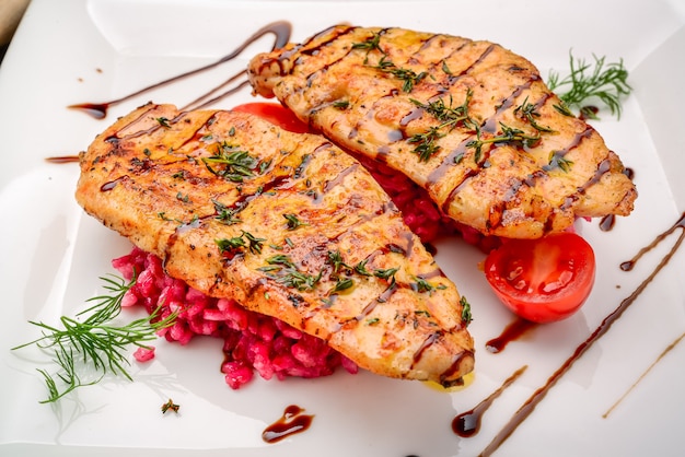 Chicken steak with rice and beetroot juice