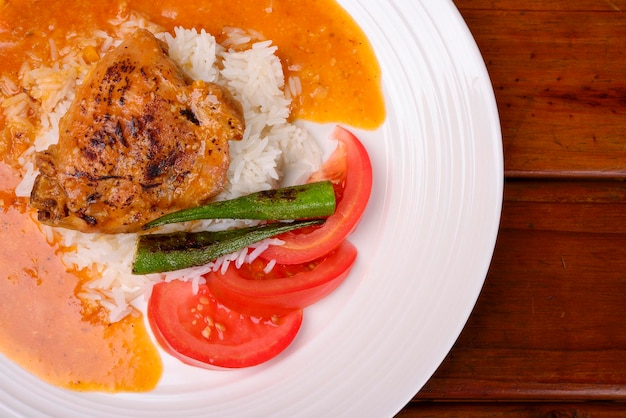 Chicken stew with rice, okra and tomatoes