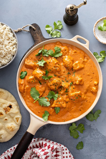 Chicken tikka masala cooked marinated chicken in spiced curry sauce