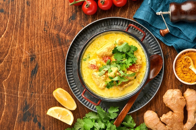 chicken tikka masala. curry, lime, ginger, cilantro, chili, rice, herbs and spices