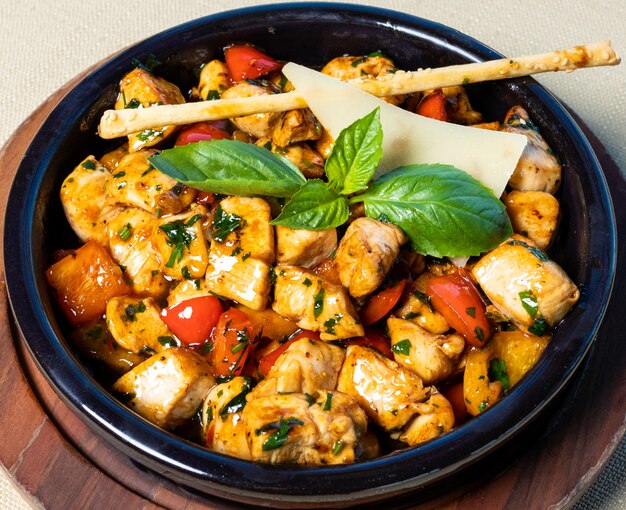 Chicken and tomato salad with basil