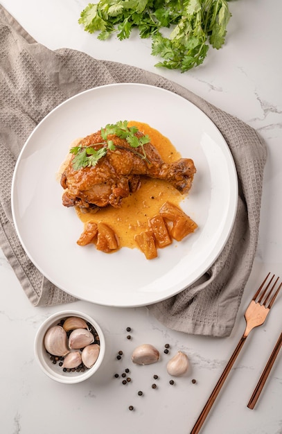 Chicken wings roasted on white plate  top view