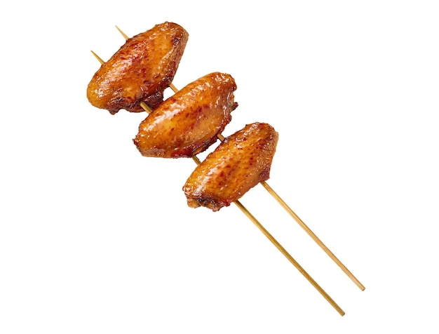 chicken wings on a skewer with a white background