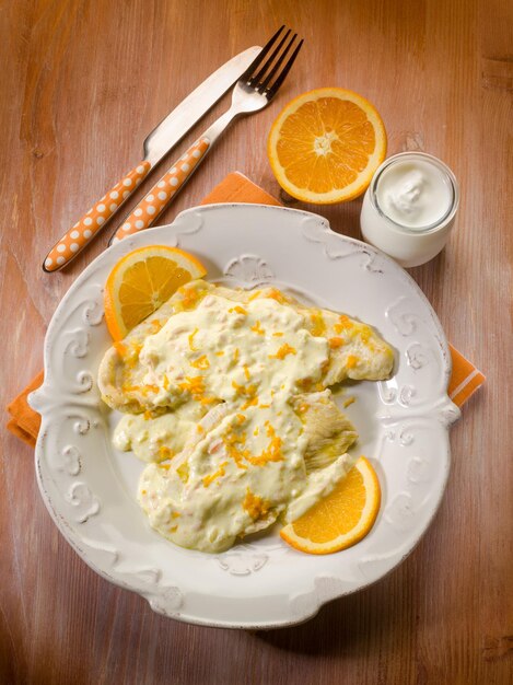 Chicken with orange and yogurt sauce