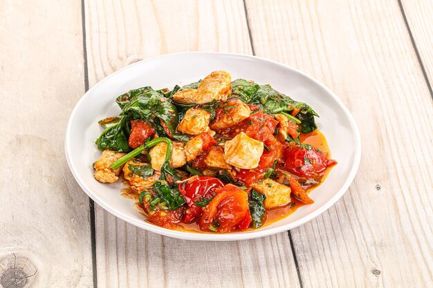 Chicken with tomato and spinach