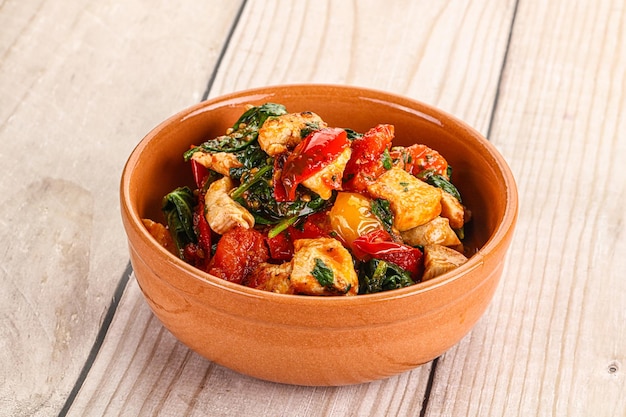 Chicken with tomato and spinach