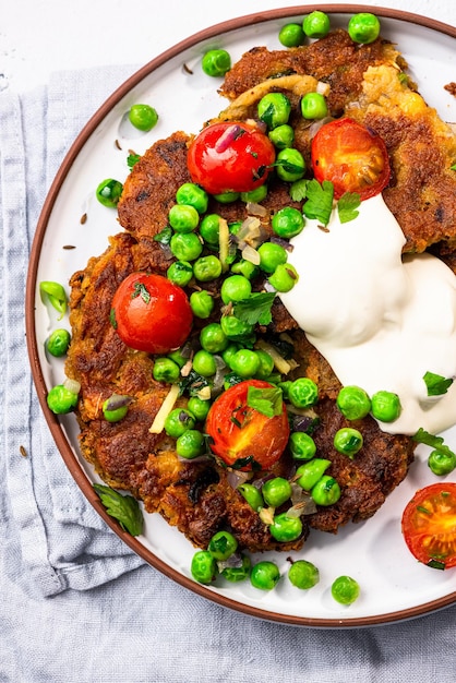 Chickpea pancakes with green peas Vegetarian superfood healthy brunch idea