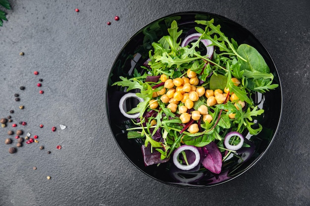 chickpea salad green leaf lettuce mix fresh healthy meal food diet snack on the table copy space