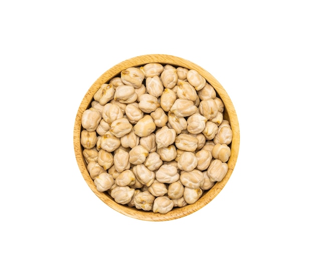 Chickpea seeds or Garganzo beans in brown wooden bowl isolated on white background top view Healthy organic super food concept