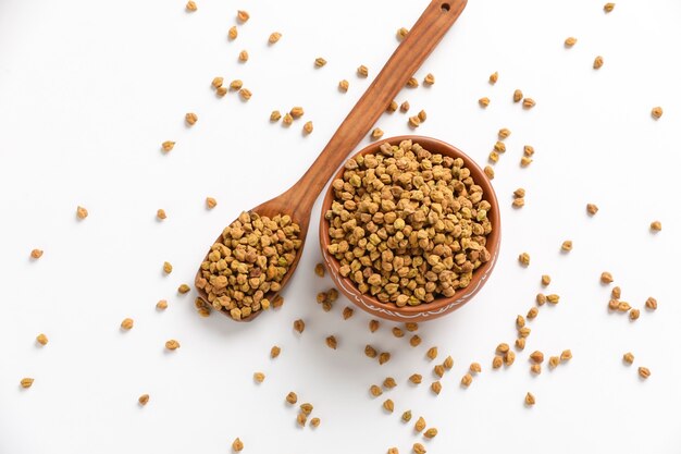 Chickpeas ( Gram) in wood bowl with spoon