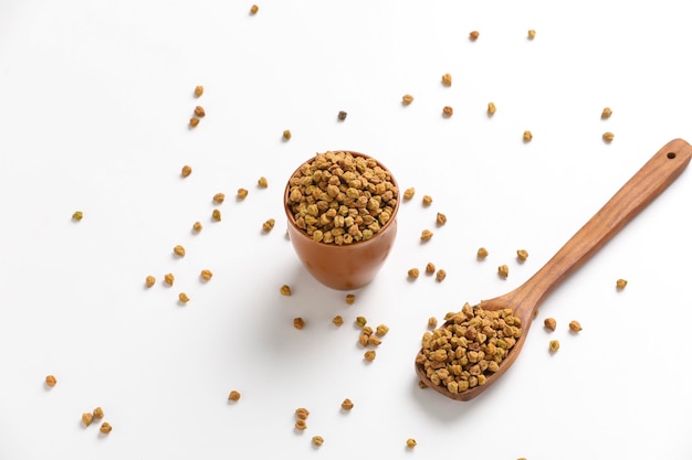 Chickpeas ( Gram) in wood bowl with spoon