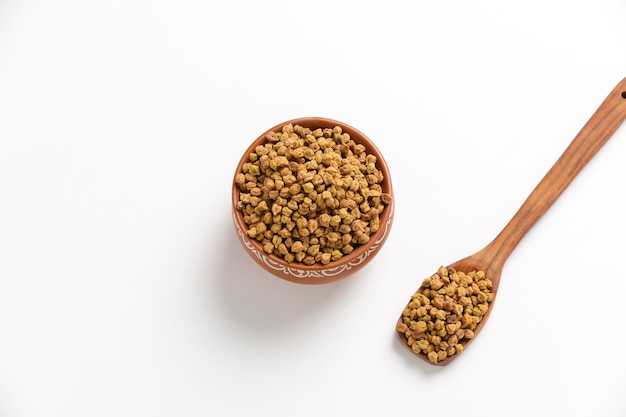 Chickpeas ( Gram) in wood bowl with spoon