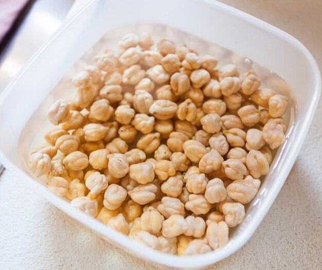 Chickpeas left in water to soak