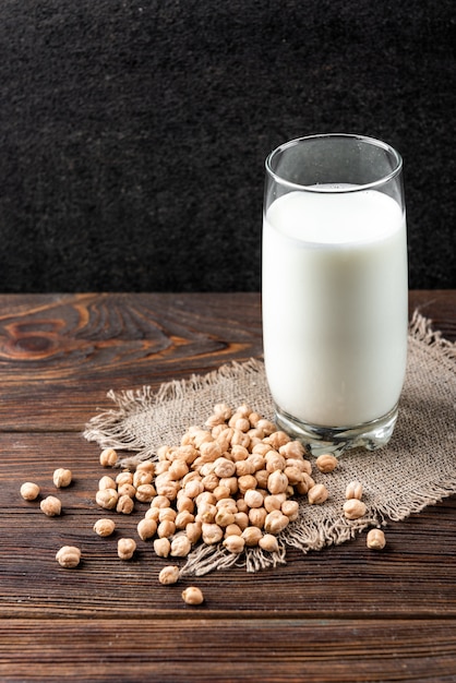 Chickpeas with a glass of milk on the table