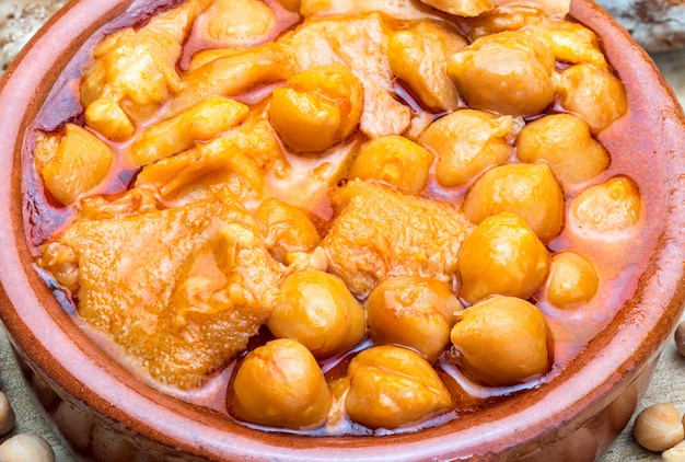 Chickpeas with tripe in clay pot.