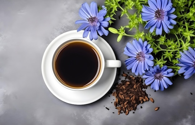 Photo chicory flowers and herbs and coffee cup on grey snowy backgroun