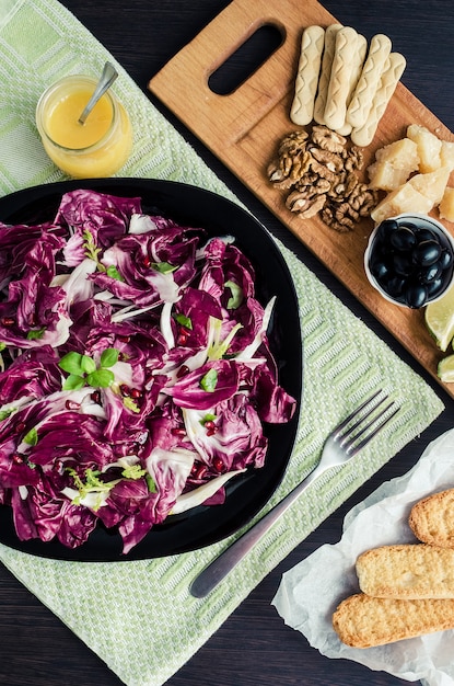 Chicory salad with appetizers set