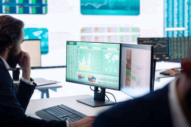 Chief financial officer studying capital funds and revenue data