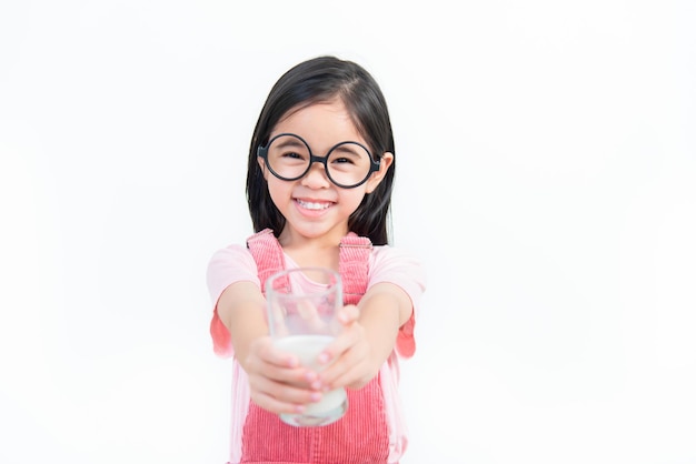 Child asia girl drink milk with a glass