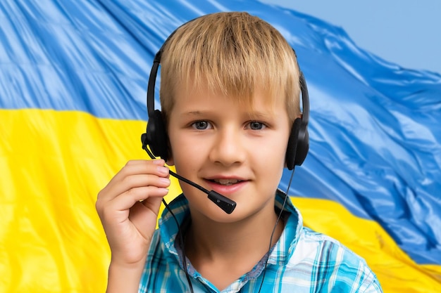 Child on the background of the flag of ukraine