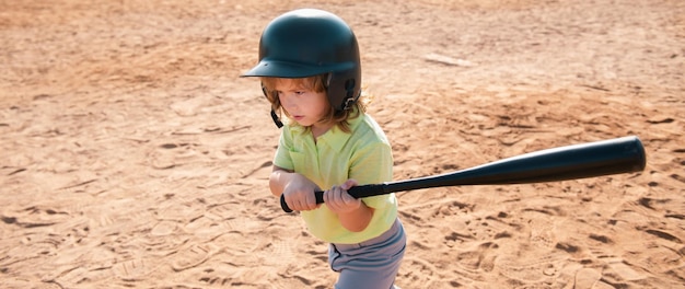Child baseball player focused ready to bat kid holding a baseball bat