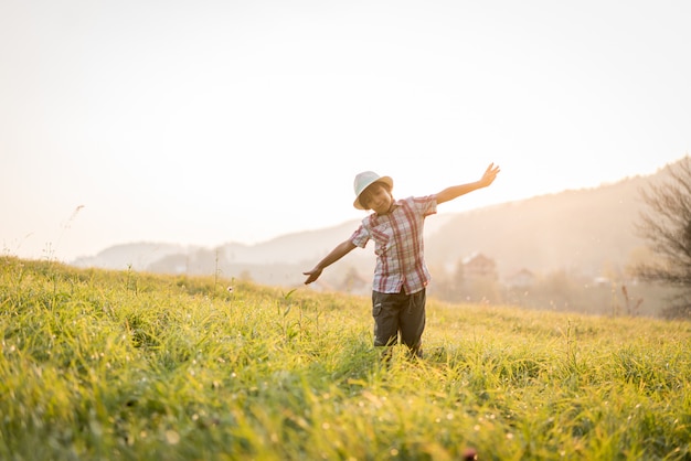 Child on beautiful grass field