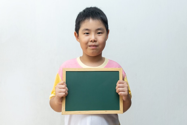 child boy holding empty board