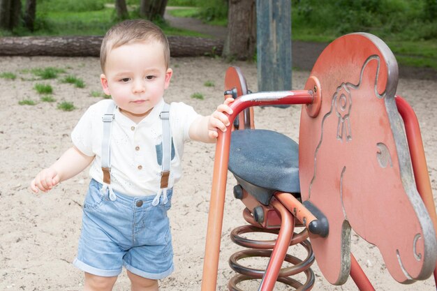 The child boy on the playground