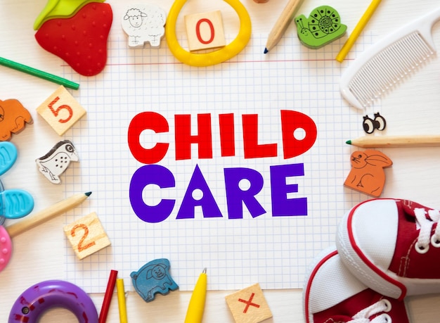 Child care Child care on notebook crossed paper