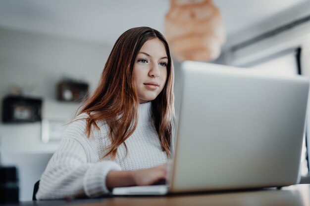 child doing homeschooling elearning at home