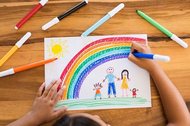 Child drawing happy family
